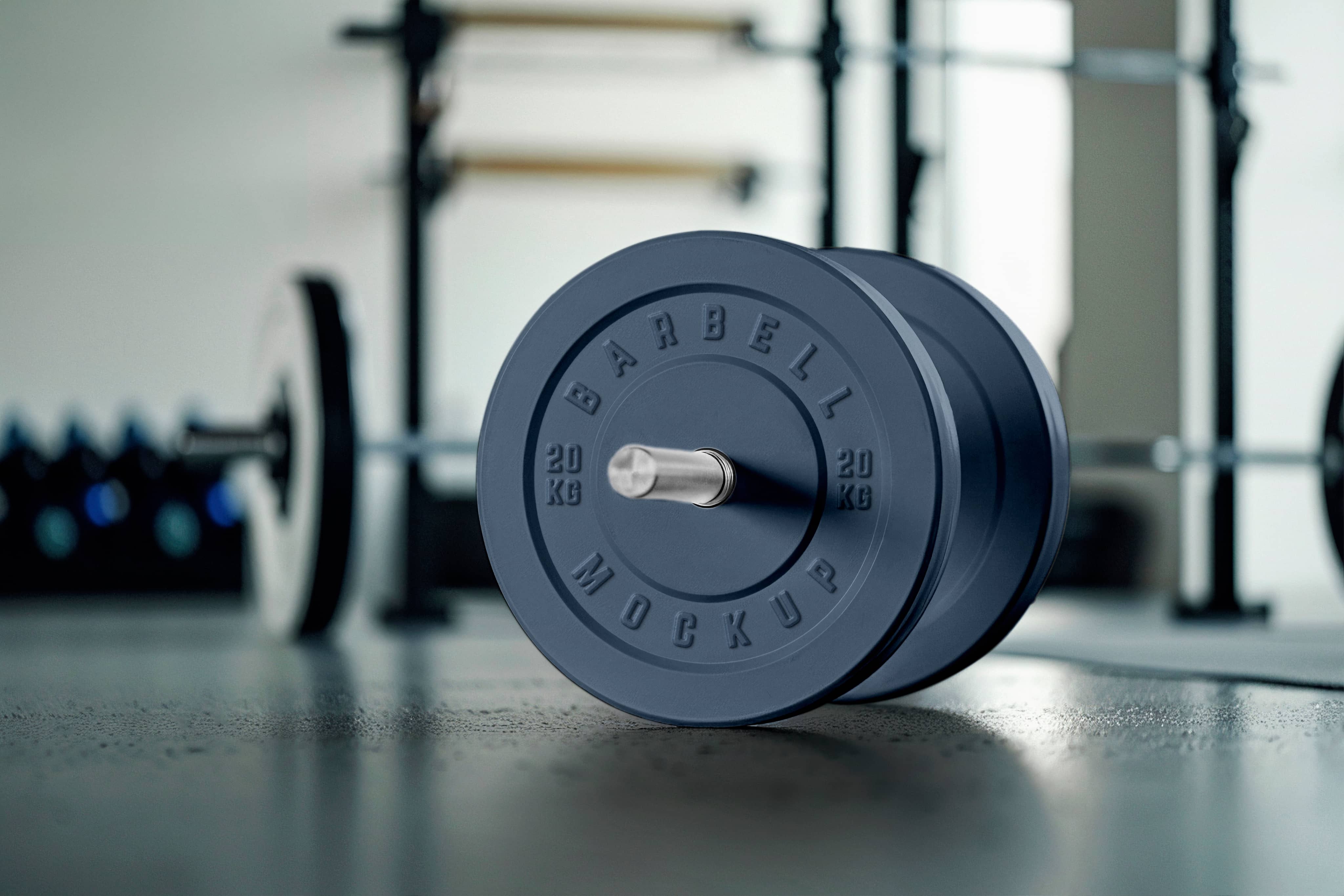 Close-up of weight plates on gym floor